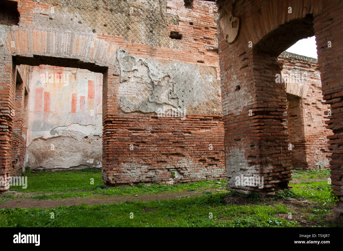 Romani originali dipinti nel sito storico di Ostia Foto Stock