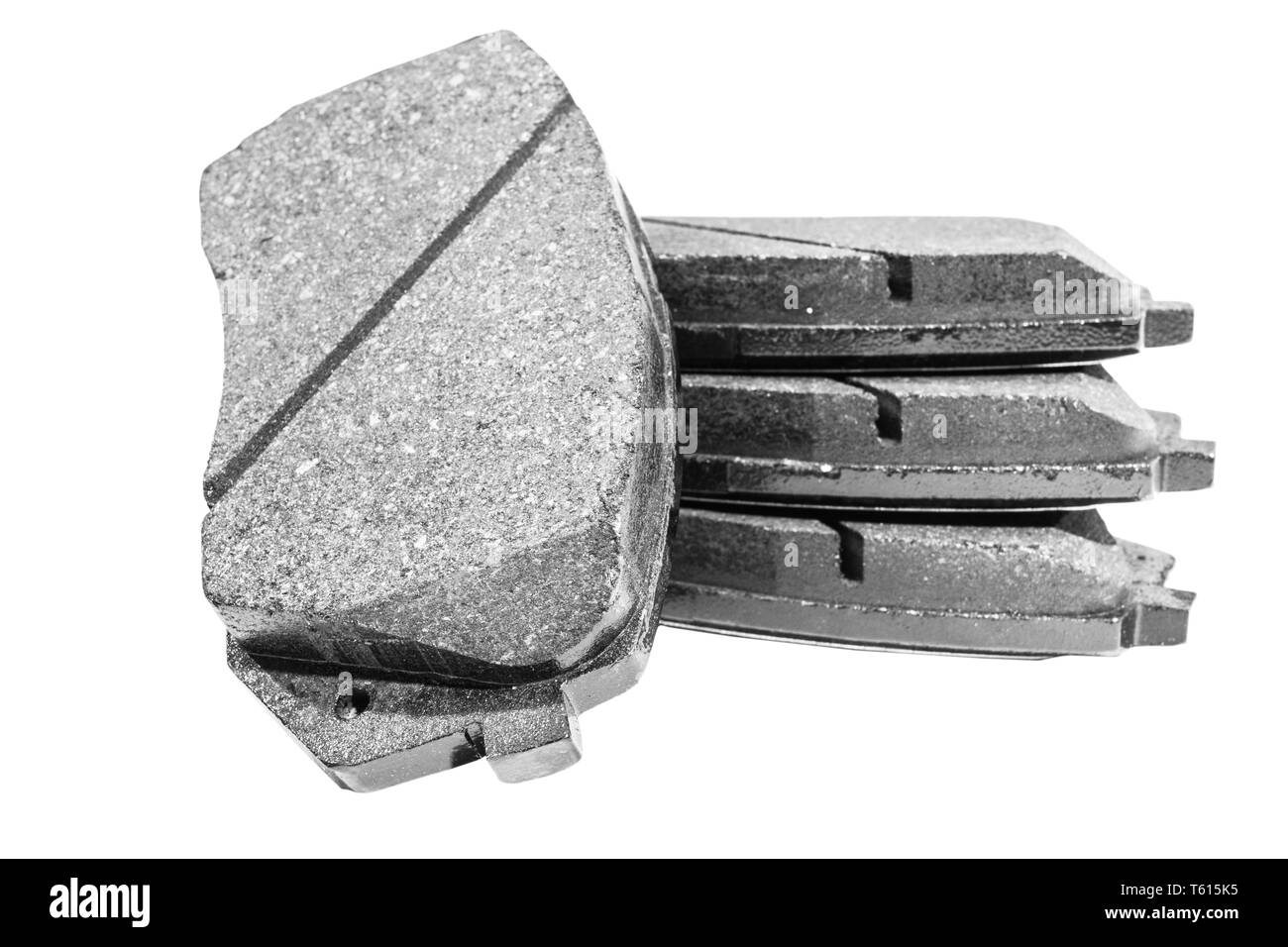 Pastiglie freno isolato su sfondo bianco. Ricambi per auto. Pastiglie freno isolato su bianco. Pastiglie frenanti. Auto parte. Dettagli auto. Parti di ricambio. In bianco e nero Foto Stock
