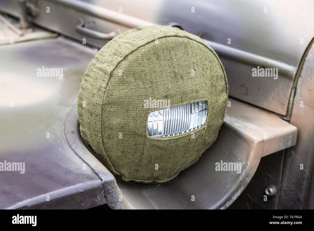 Proiettore di auto retrò con protezione di copertura tessile close up Foto Stock