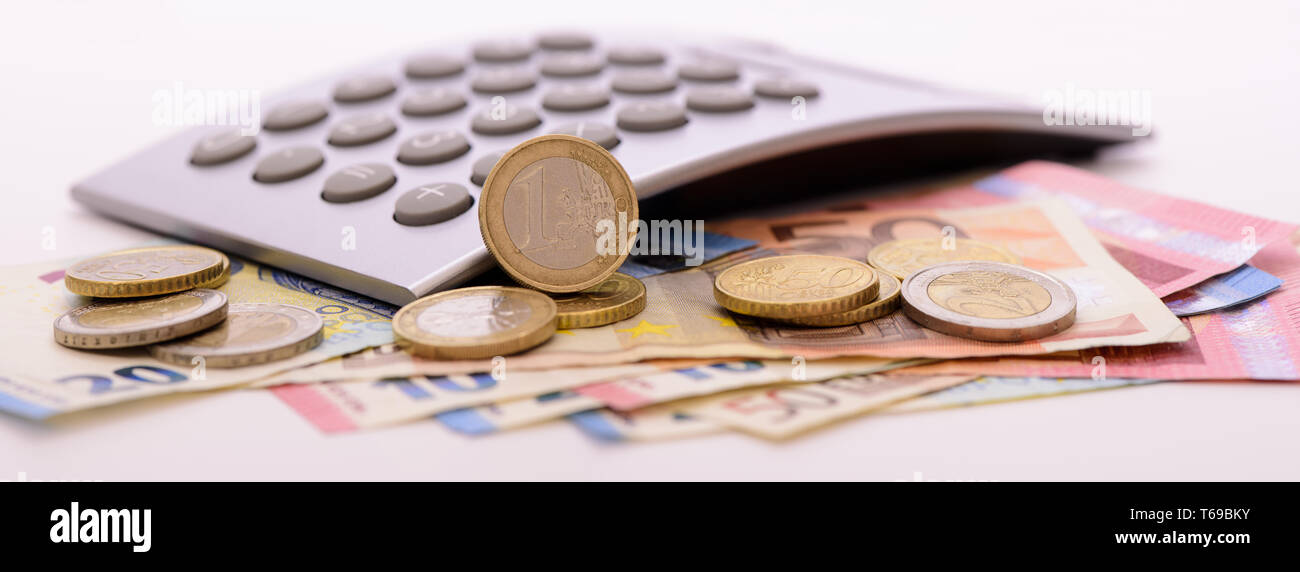Costruzione casa con plan, euro e calcolatrice Foto Stock