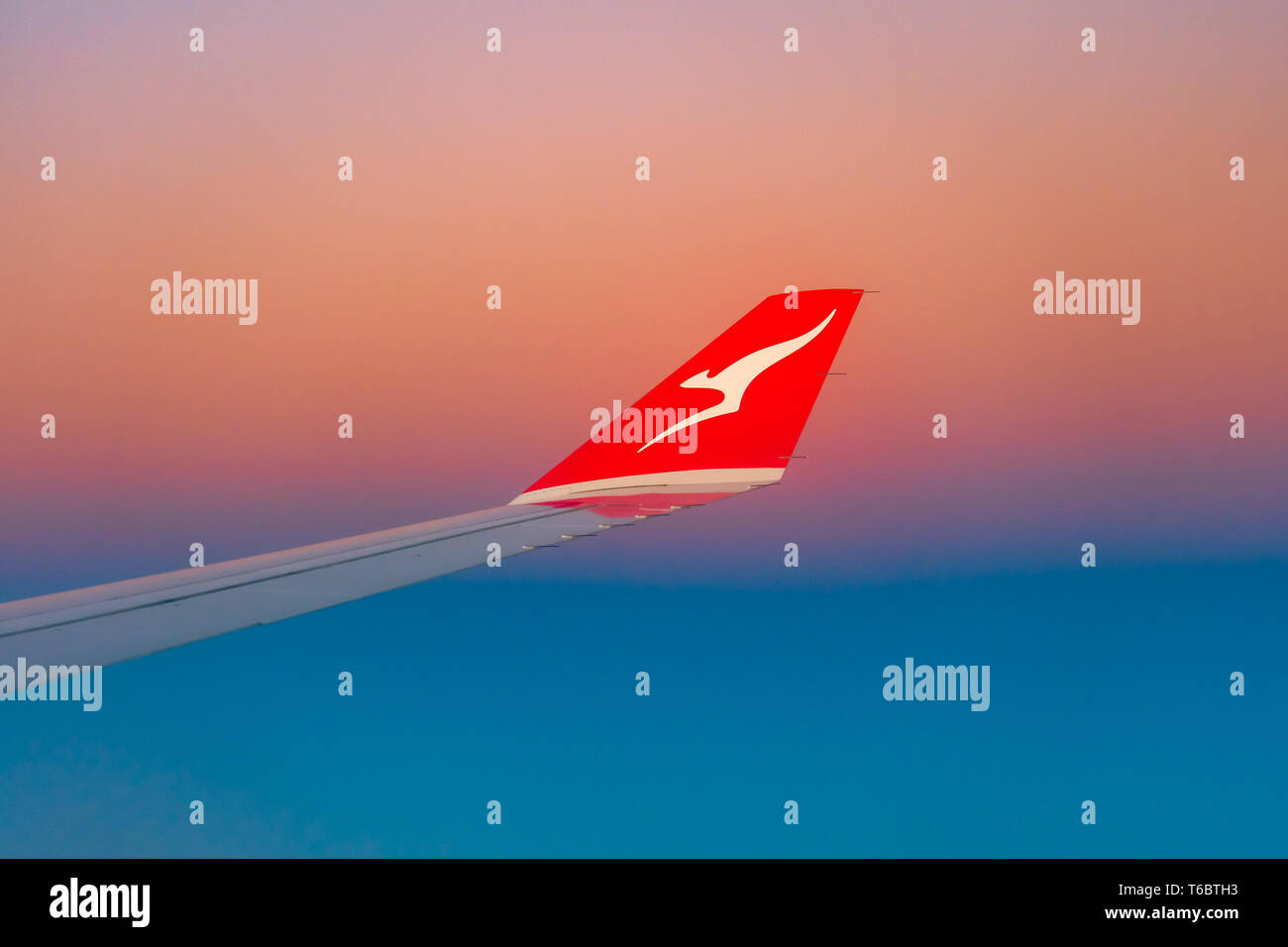 Qantas ala piano di sunrise Foto Stock