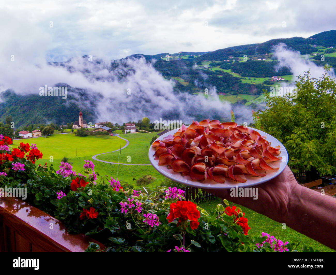 Il cibo delle Dolomiti: Speck Foto Stock