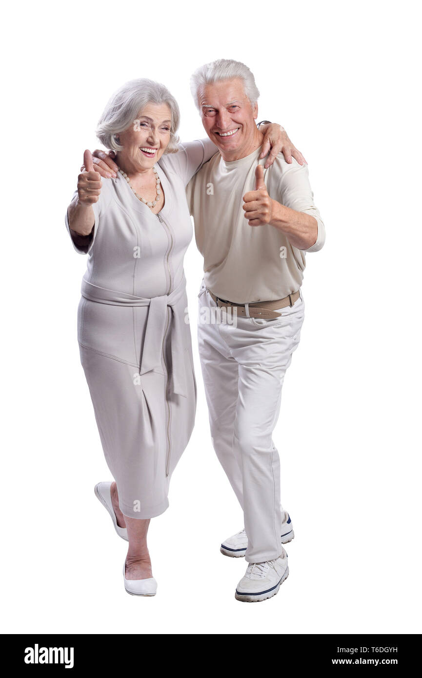 Ritratto di felice coppia senior mostrando pollice in alto Foto Stock