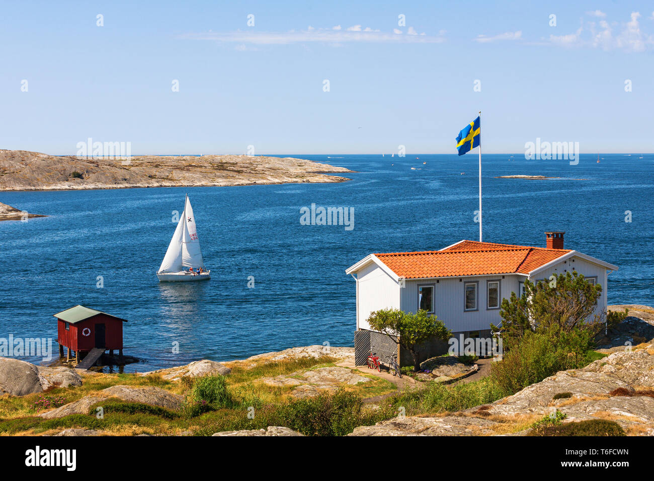 Casa per le vacanze in riva al mare Foto Stock