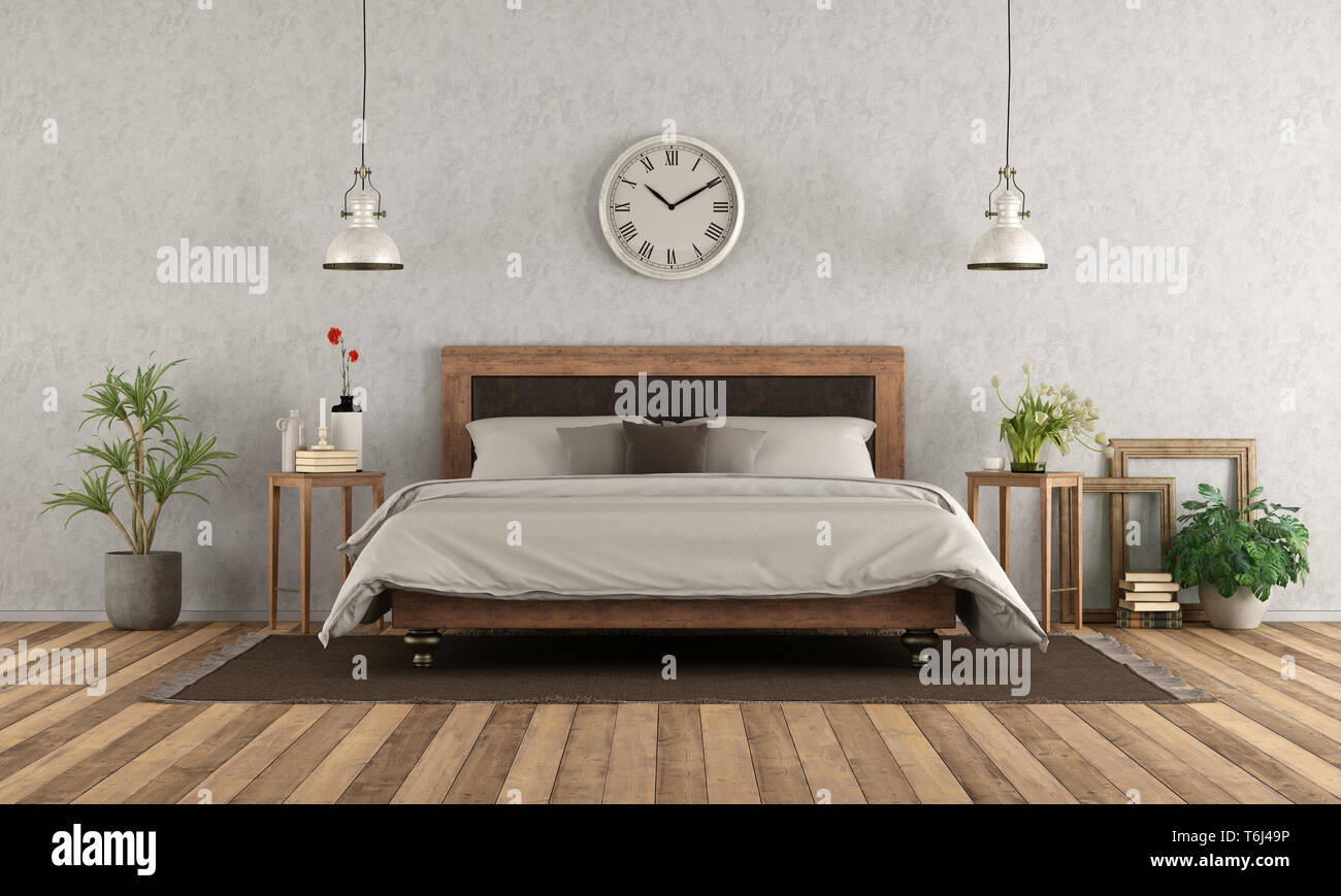 Camera da letto matrimoniale in stile classico con un elegante letto matrimoniale su pavimento in legno duro - 3d rendering Foto Stock