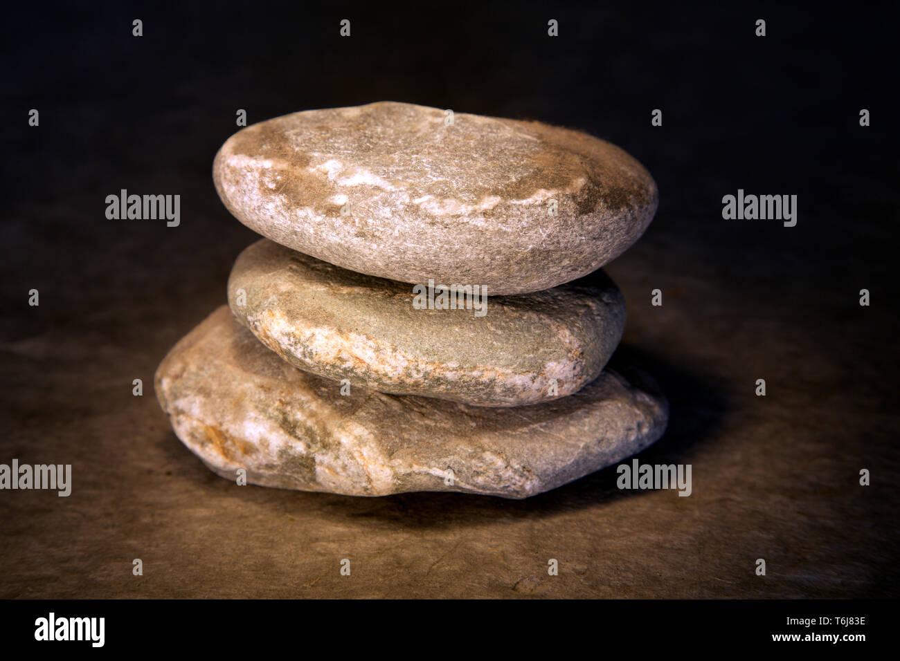 Tre pietre piatte. Foto Stock