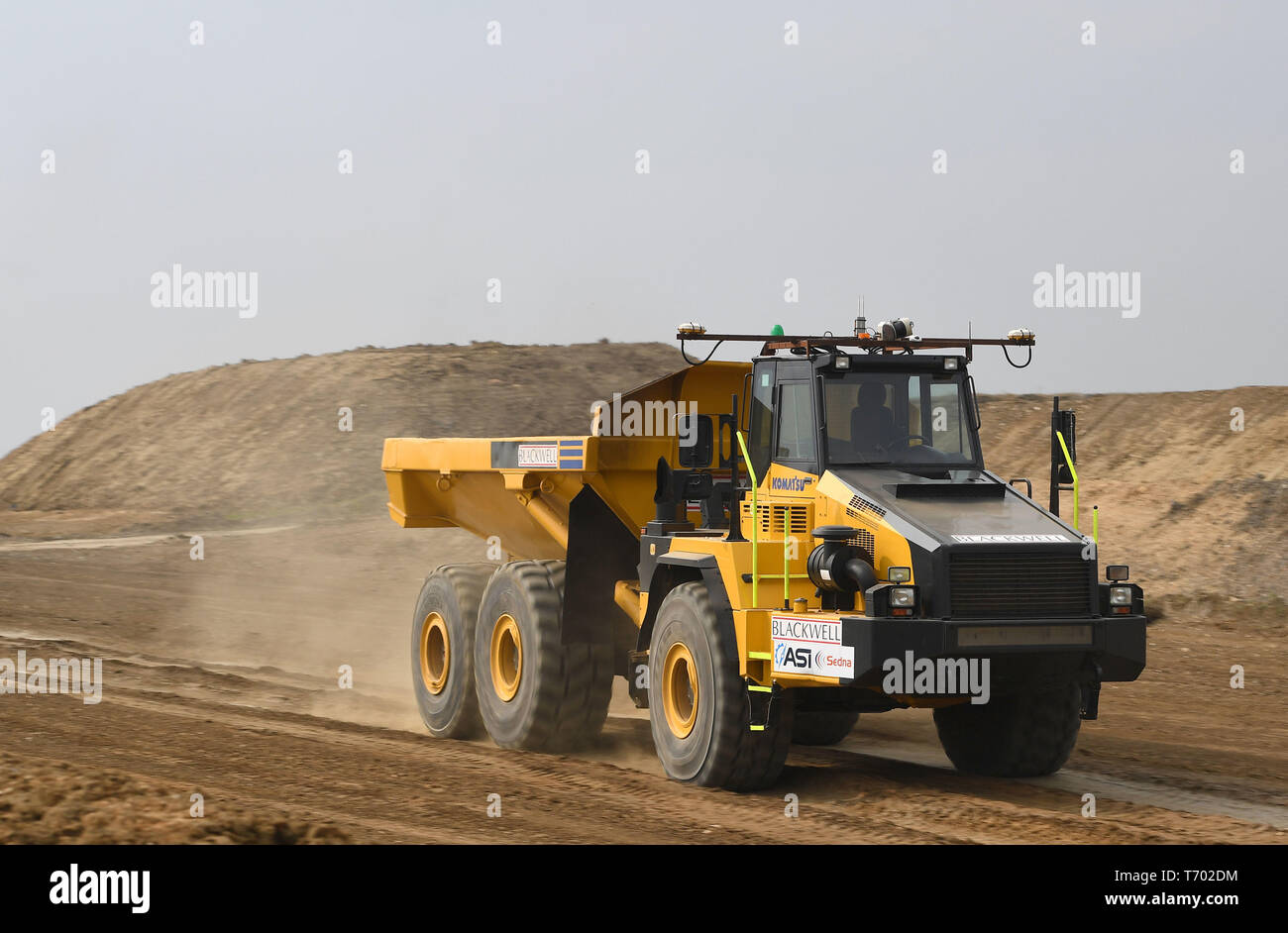 Un sistema automatizzato driverless dumper durante il test per la prima volta in Inghilterra nel Regno Unito il più grande aggiornamento di strada, il regime per migliorare la A14 tra Cambridge e di Huntingdon. Foto Stock