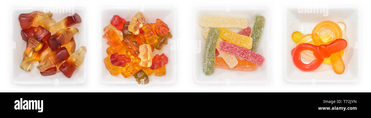 Raccolta di diversi dolci con frutta gum in ciotole in vista superiore Foto Stock