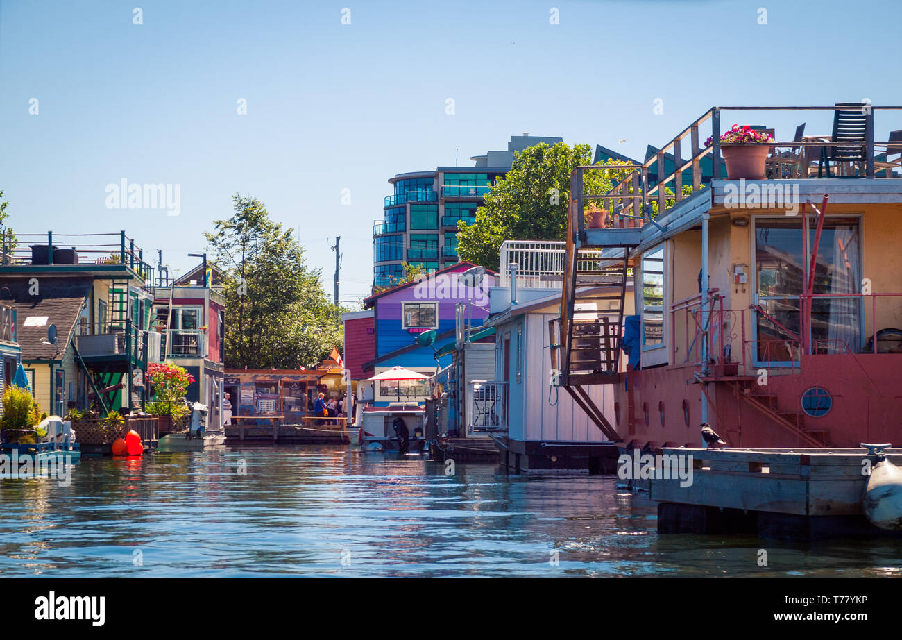 Pittoresche case galleggianti galleggianti in Fisherman Wharf in Victoria, British Columbia, Canada. Foto Stock