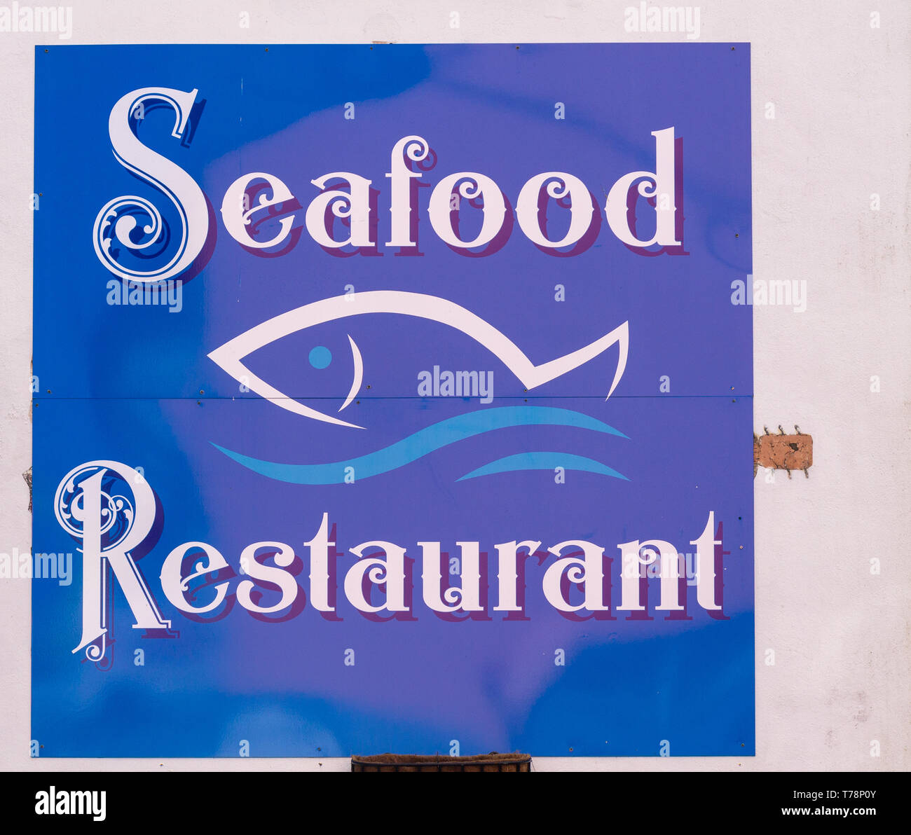 Segno su una parete di ristorante Foto Stock