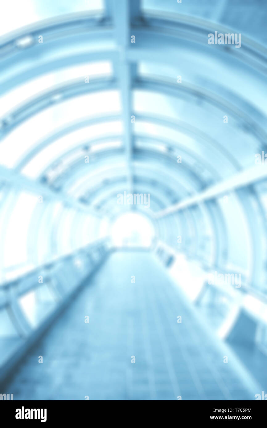 Sfocare lo sfondo con tunnel futuristico. Foto in tonalità di colore blu Foto Stock