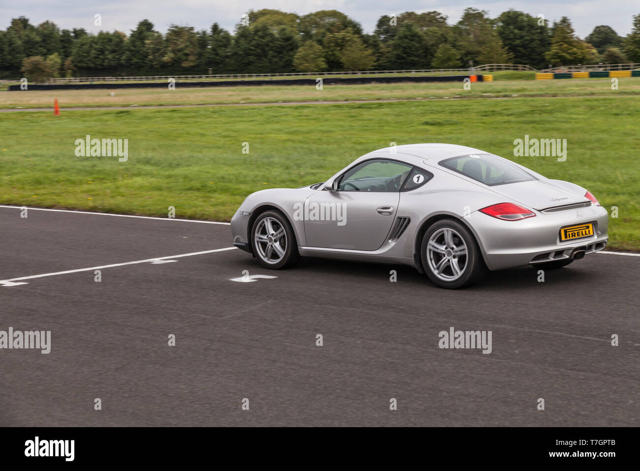 Una Porsche Cayman auto sportiva a Croft Autodromo,North Yorkshire, Inghilterra, Regno Unito Foto Stock