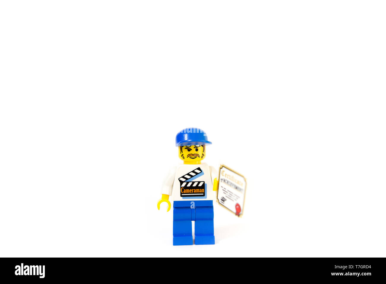 Un LEGO film maker in possesso di un certificato di conseguimento, questo cameraman progredire la sua carriera. Foto Stock