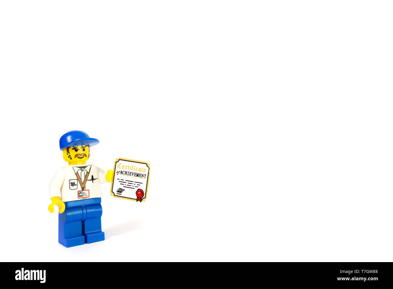 Un LEGO film maker in possesso di un certificato di conseguimento, questo cameraman progredire la sua carriera. Foto Stock