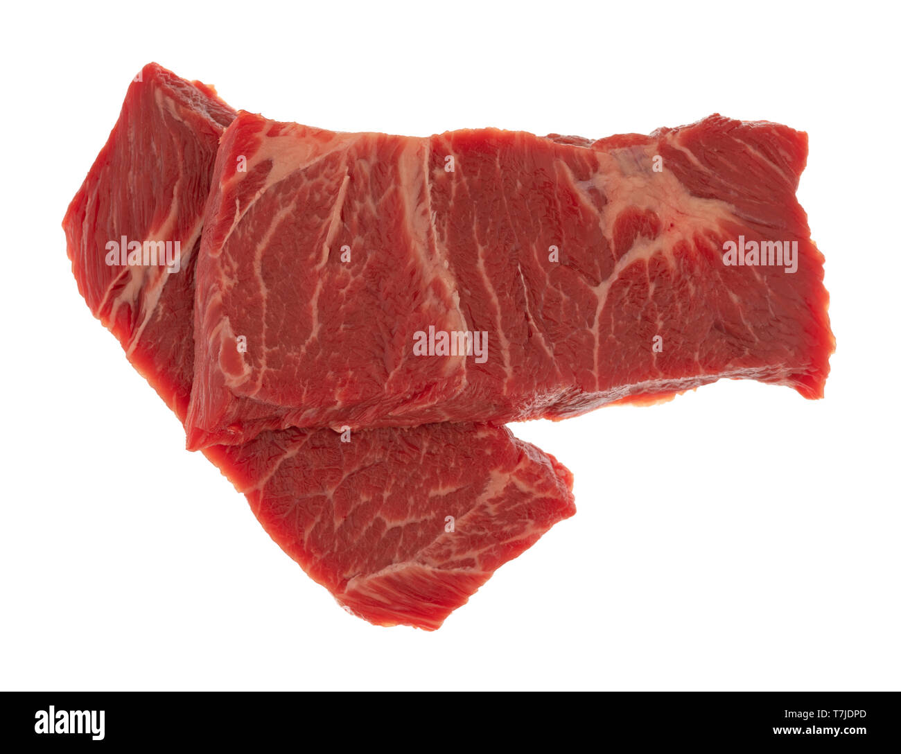Vista aerea di due fette di carne bovina disossata mandrino nervatura corta bistecca di grigliatura isolato su uno sfondo bianco. Foto Stock