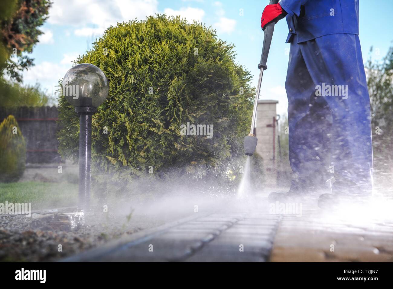 Pressione di viale di Washington. Mattoni di pulizia stradale e percorsi del giardino. Foto Stock