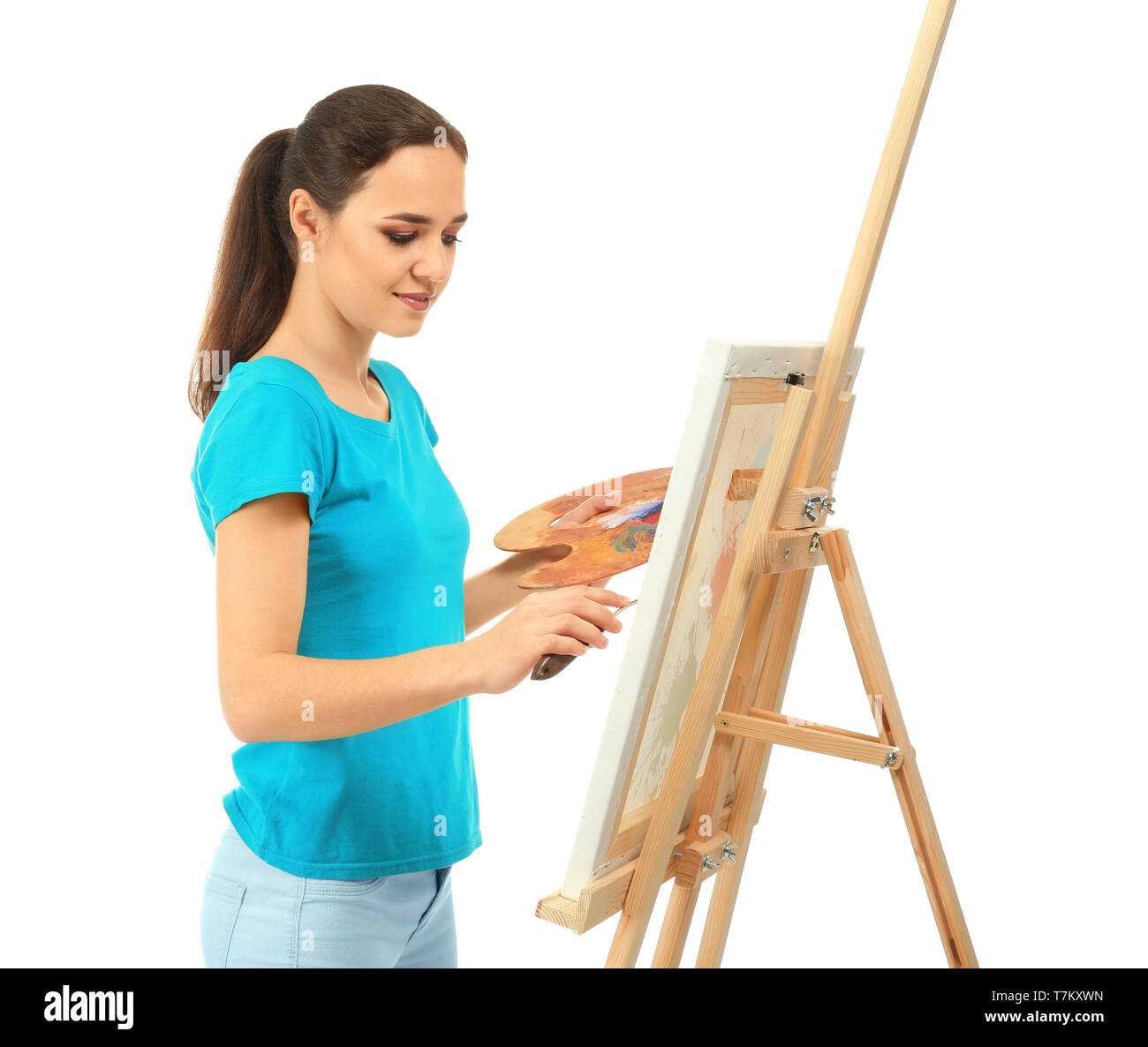 Artista femminile pittura immagine su sfondo bianco Foto Stock