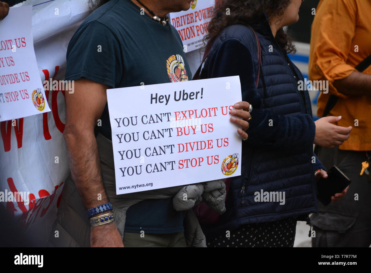 Autostop piloti di rally per una migliore retribuzione e condizioni di lavoro nella città di New York. Foto Stock