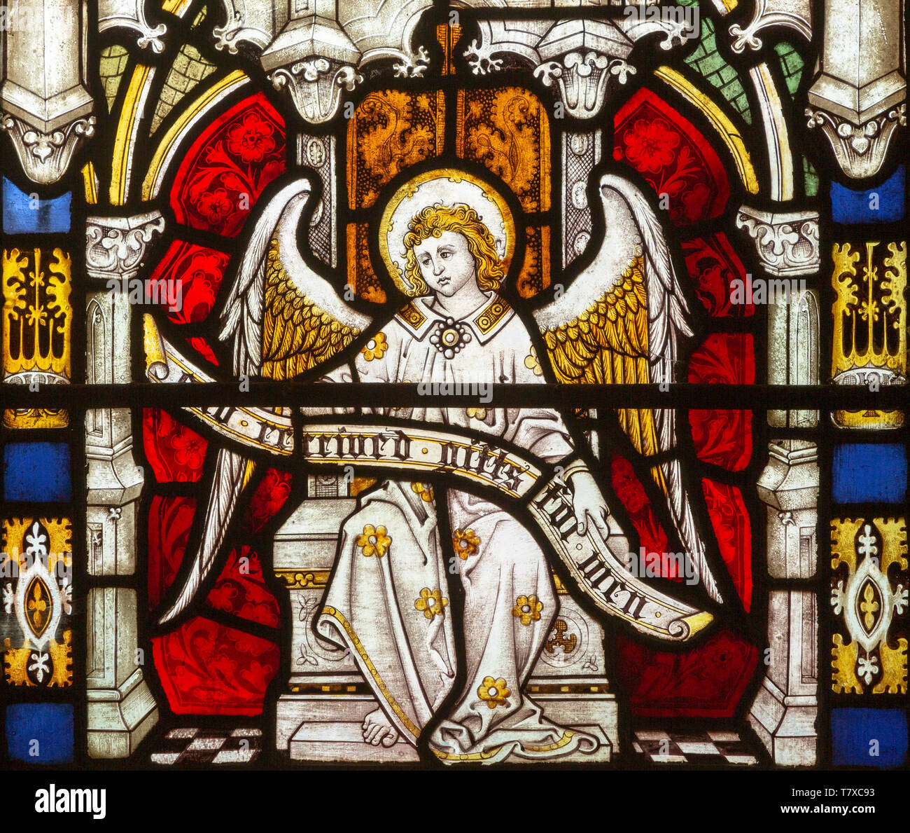 Angelo con ali vetrata chiesa della Santa Trinità, Long Melford, Suffolk, Inghilterra, Regno Unito Foto Stock
