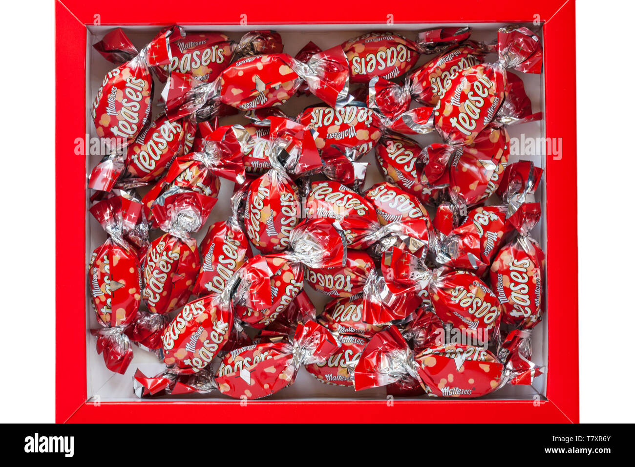Maltersers occhiolini cioccolatini in scatola aperta per mostrare i contenuti Foto Stock