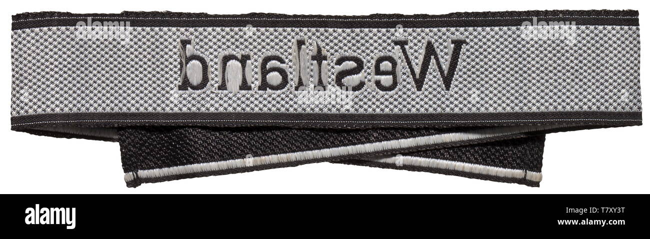 Un sleeveband 'Westland' per uomini arruolati/sottufficiali della SS-Infanterie-Regiment, più tardi rinominata decimo SS-Panzer-Grenadier-reggimento della 5SS-Panzer-Division " WIKING". Nero e grigio-argento BeVo tipo con estremità cucita e tessuto produttore nome 'BEVO-WUPPERTAL'. Non sottoscritto. Lunghezza 49 cm. storica, storica del xx secolo, 1930S, 1940s, secret service, servizio di sicurezza, servizi segreti, i servizi di sicurezza, polizia, servizio armato, servizi armati, NS, il socialismo nazionale, il nazismo, il terzo Reich, Reich tedesco, Germania, utensile e un pezzo di attrezzature, utensili, oggetto, oggetti, alambicchi, clipping, cl, Editorial-Use-solo Foto Stock