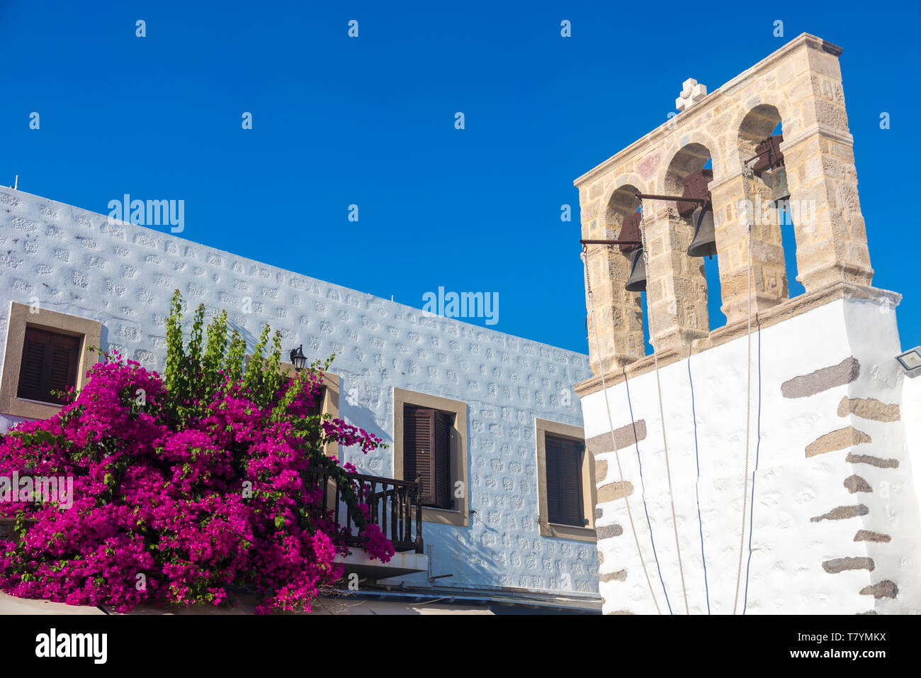 Campanile con tre campane in Mykonos - Grecia Foto Stock