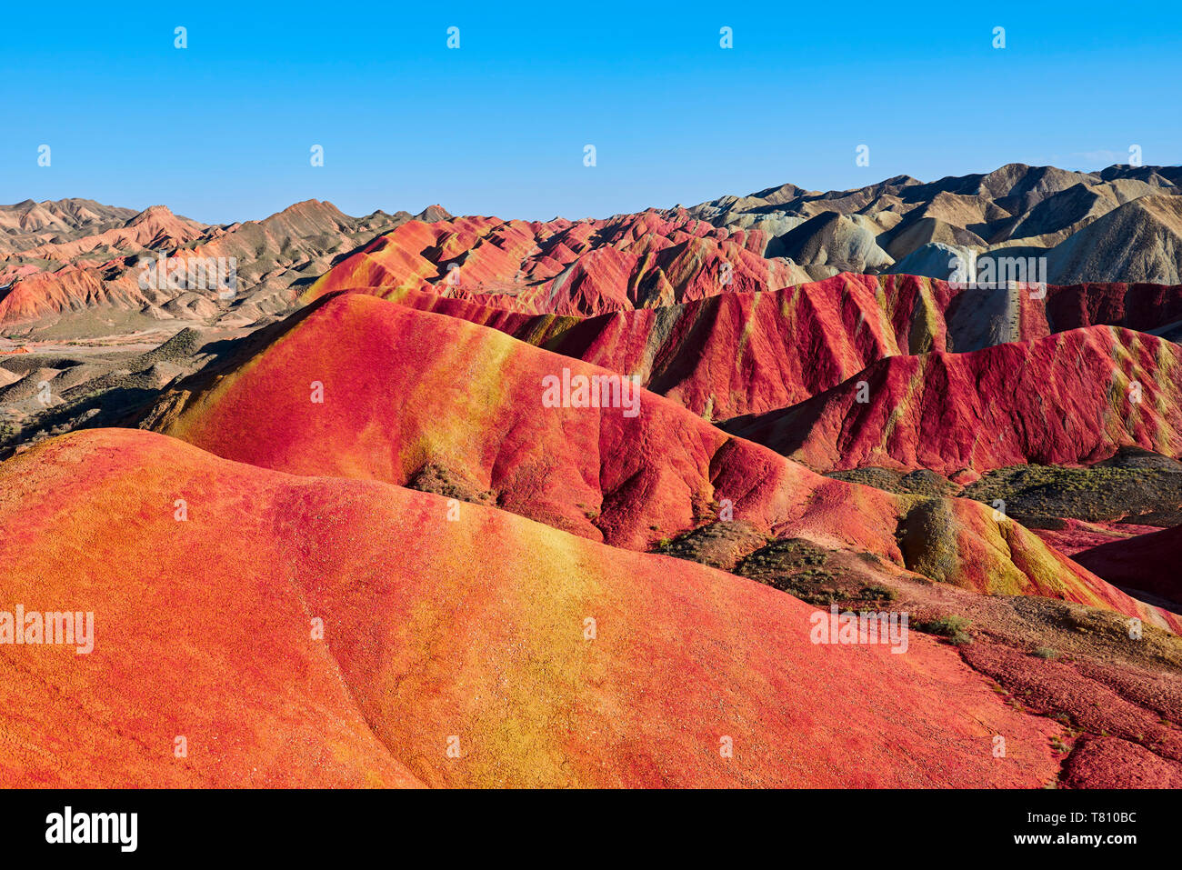 Danxia colorati rilievi in Zhangye, Sito Patrimonio Mondiale dell'UNESCO, provincia di Gansu, Cina e Asia Foto Stock