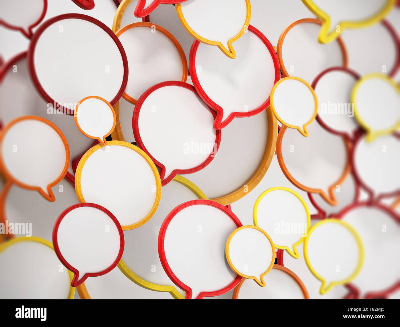 Rosso, giallo e arancione discorso palloncini formando uno sfondo. 3D'illustrazione. Foto Stock