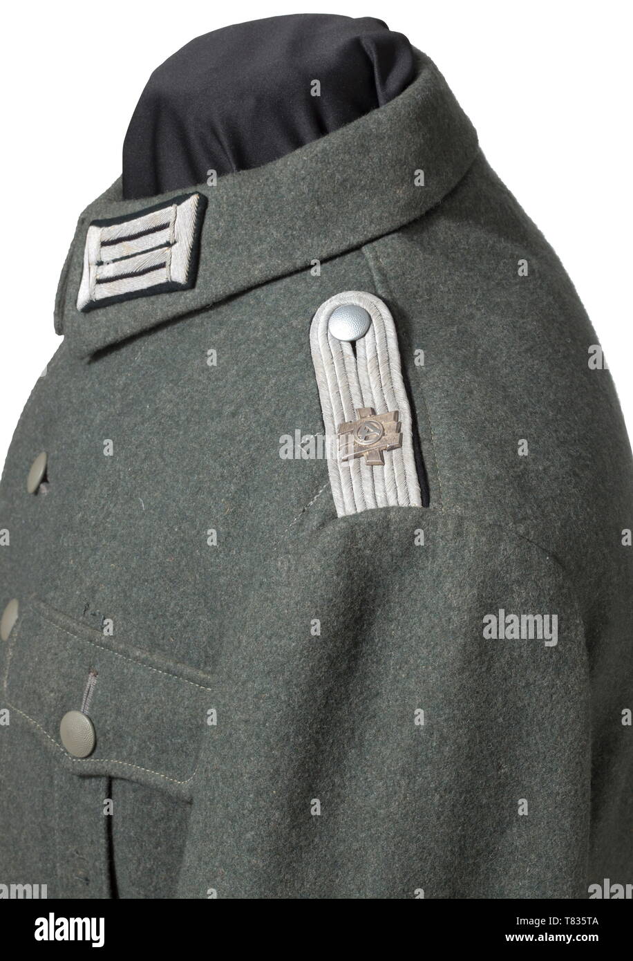 Una tunica di campo M 43 per un tenente dei pionieri del reggimento Feldherrnhalle campo-grigio pezzo in magazzino M 43, modificati per gli ufficiali. Ricamati a mano con collare patch, cuciti in schede di spalla con Feldherrnhalle appliqué, ricamati a mano con officer's eagle, cucito Feldherrnhalle sleeveband, ordini loops, grigio seta artificiale fodera. La tunica è in un quasi mint stato di conservazione. storica, storica, ingegnere, Sappers e minatori, ingegneri, militare, militaria, ramo di servizio, rami di servizio, documenti, documento, clipping, clippings, tagliate, cut-out, ritagli Editorial-Use-solo Foto Stock