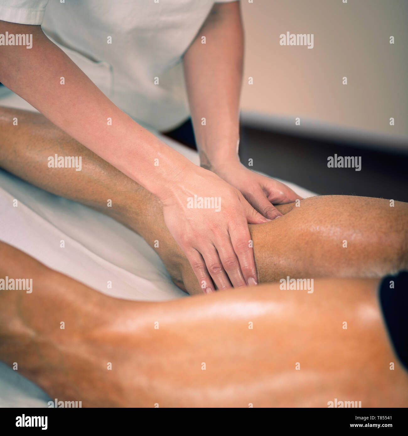 Massaggio sportivo Foto Stock