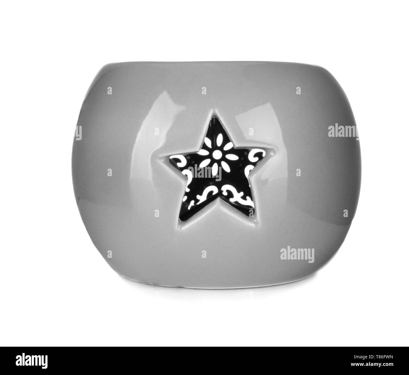 Bella candela titolare su sfondo bianco Foto Stock