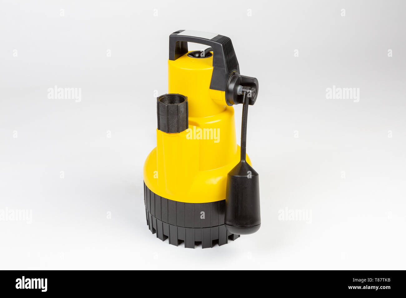 Sommergibile pompa di drenaggio per cancellare la piscina di acqua. Foto Stock