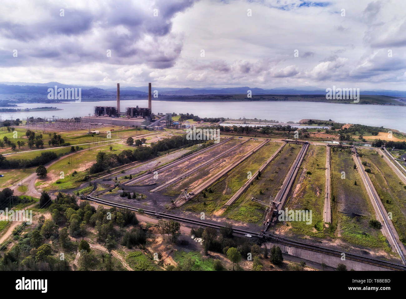 LIddell power station sulle rive del lago Liddell nella Hunter Valley regione di Australia bruciare combustibili fossili carbone nero scavato da aprire miniere di carbone. Foto Stock