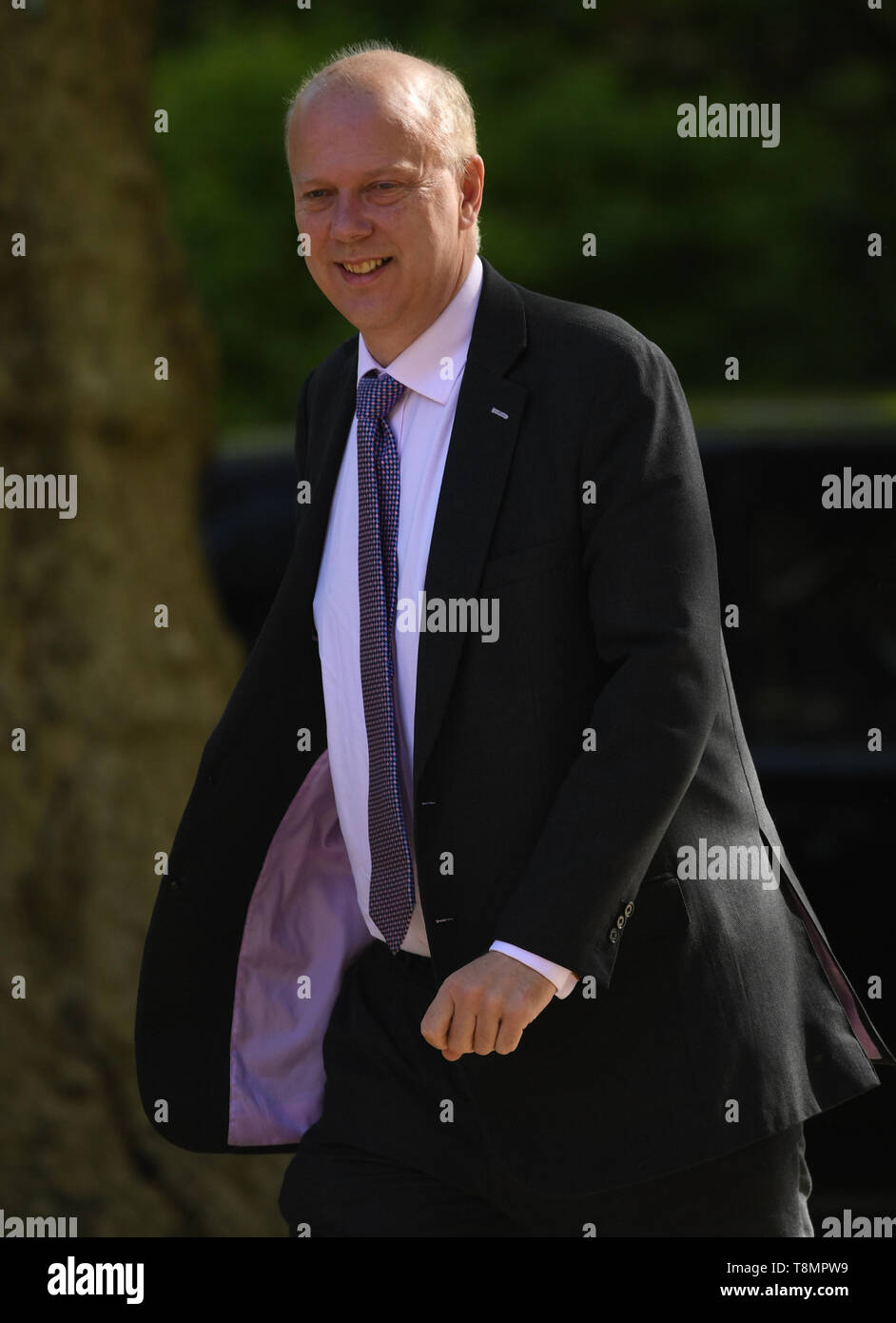 Segretario dei trasporti Chris Grayling arriva per una riunione del gabinetto a 10 Downing Street, Londra. Foto Stock