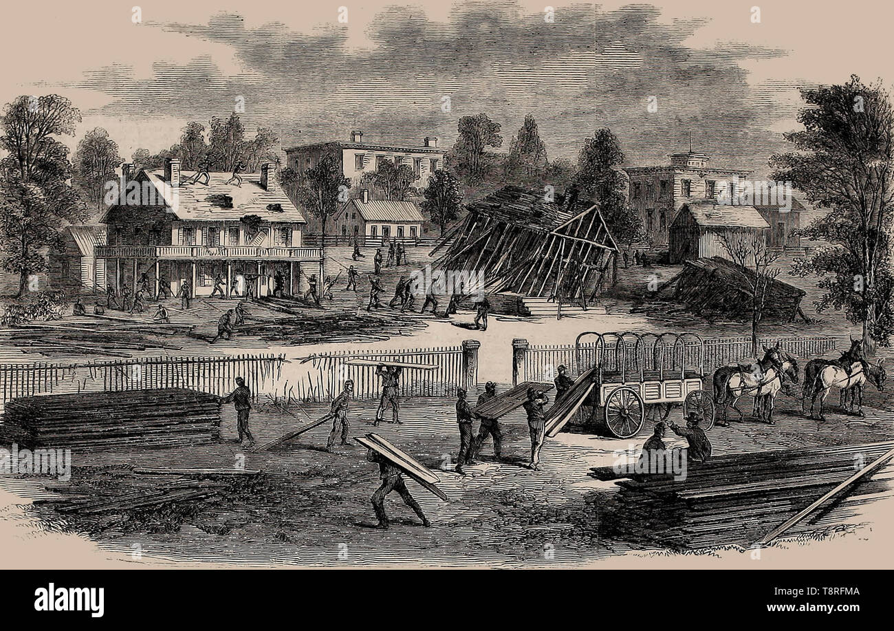Sherman per la campagna in Georgia - soldati americani, ad Atlanta, Georgia, abbattendo gli edifici in frantumi durante il tardo bombardamento. La guerra civile americana, 1864 Foto Stock