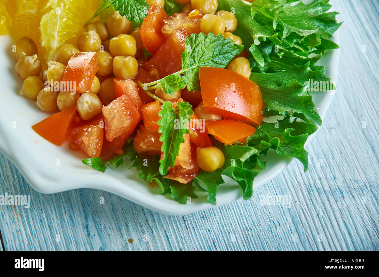 Pancetta di ceci insalata con vinaigrette Cran-Orange Foto Stock