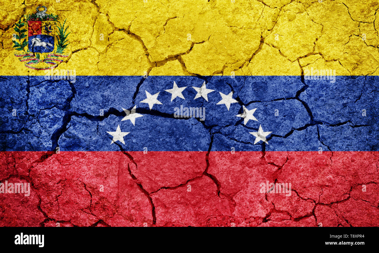 Repubblica bolivariana del Venezuela bandiera sulla terra arida terra sfondo texture Foto Stock