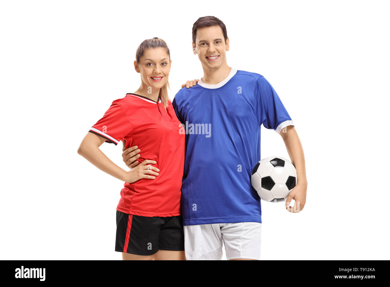 Maschi e femmine di giocatori di calcio con un pallone da calcio isolati su sfondo bianco Foto Stock