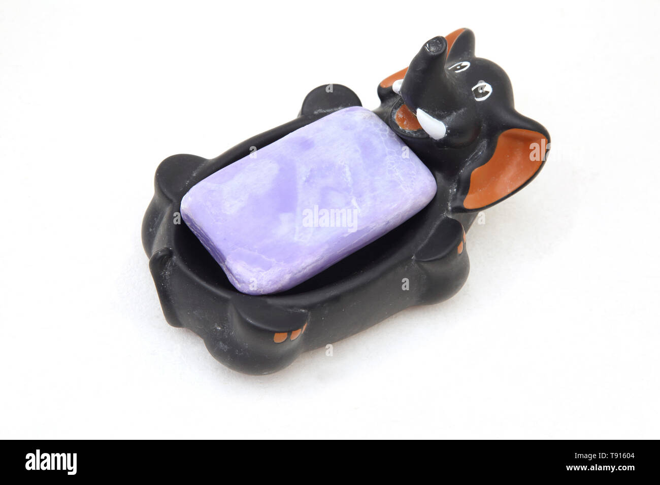 Flottante Soapdish elefante con barra di sapone Foto Stock