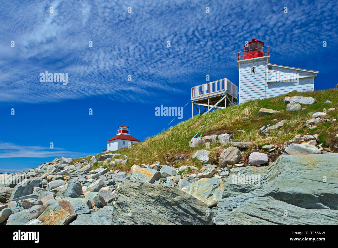 Bickerton porta faro e Lightkeeper's house sulla costa rocciosa di teh Oceano Atlantico, Porto Bickerton, Nova Scotia, Canada Foto Stock