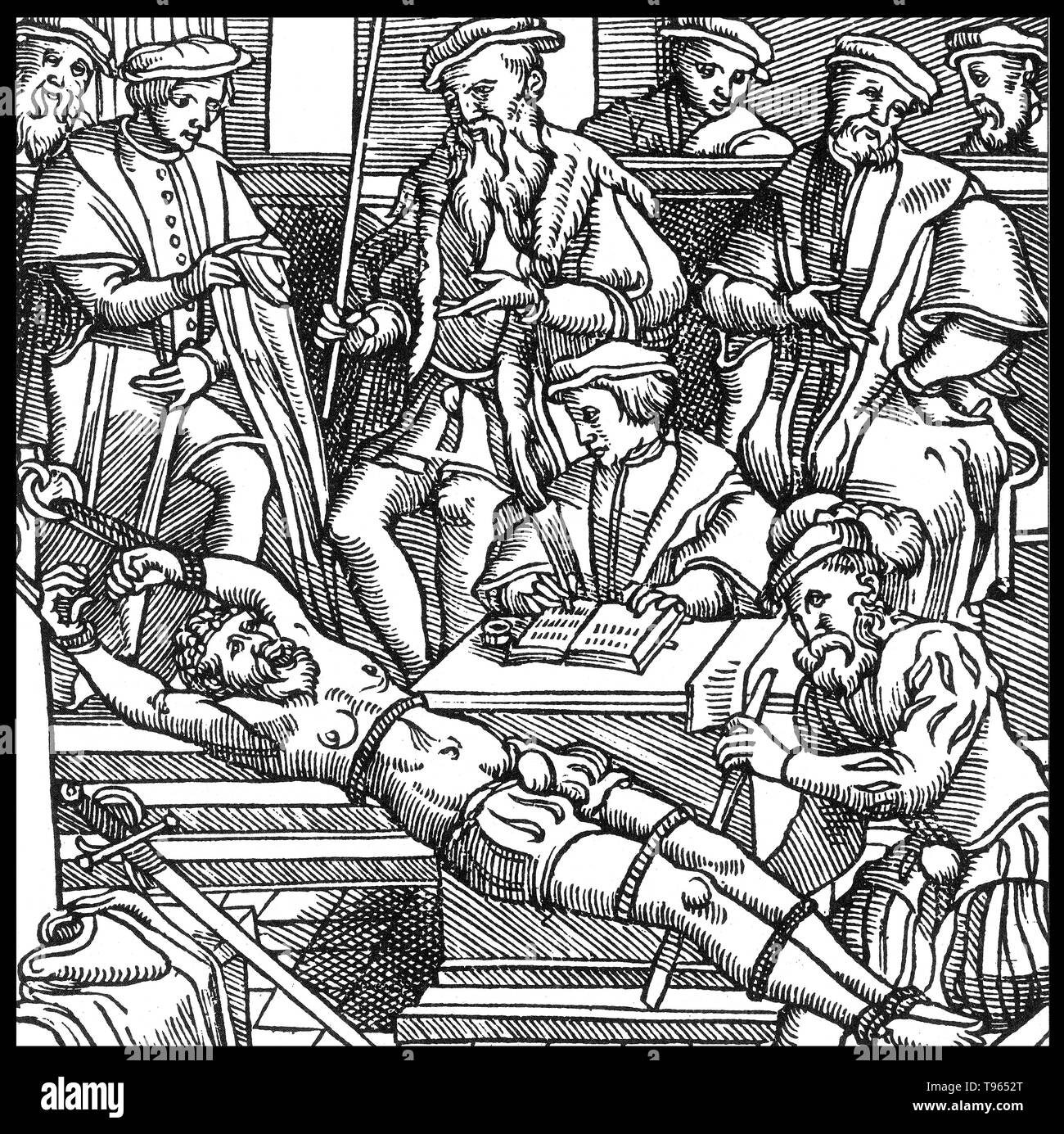 La cremagliera è una tortura dispositivo costituito da una forma rettangolare, solitamente il telaio in legno, leggermente sollevata dal terreno con un rullo in corrispondenza di una o entrambe le estremità. La vittima le caviglie sono fissato ad un rullo ed i polsi sono concatenate all'altro. Come l'interrogazione progredisce, una maniglia ed un meccanismo a cricchetto collegato al rullo superiore sono utilizzati per molto gradualmente aumentare la tensione sulle catene, inducendo un dolore straziante. Foto Stock