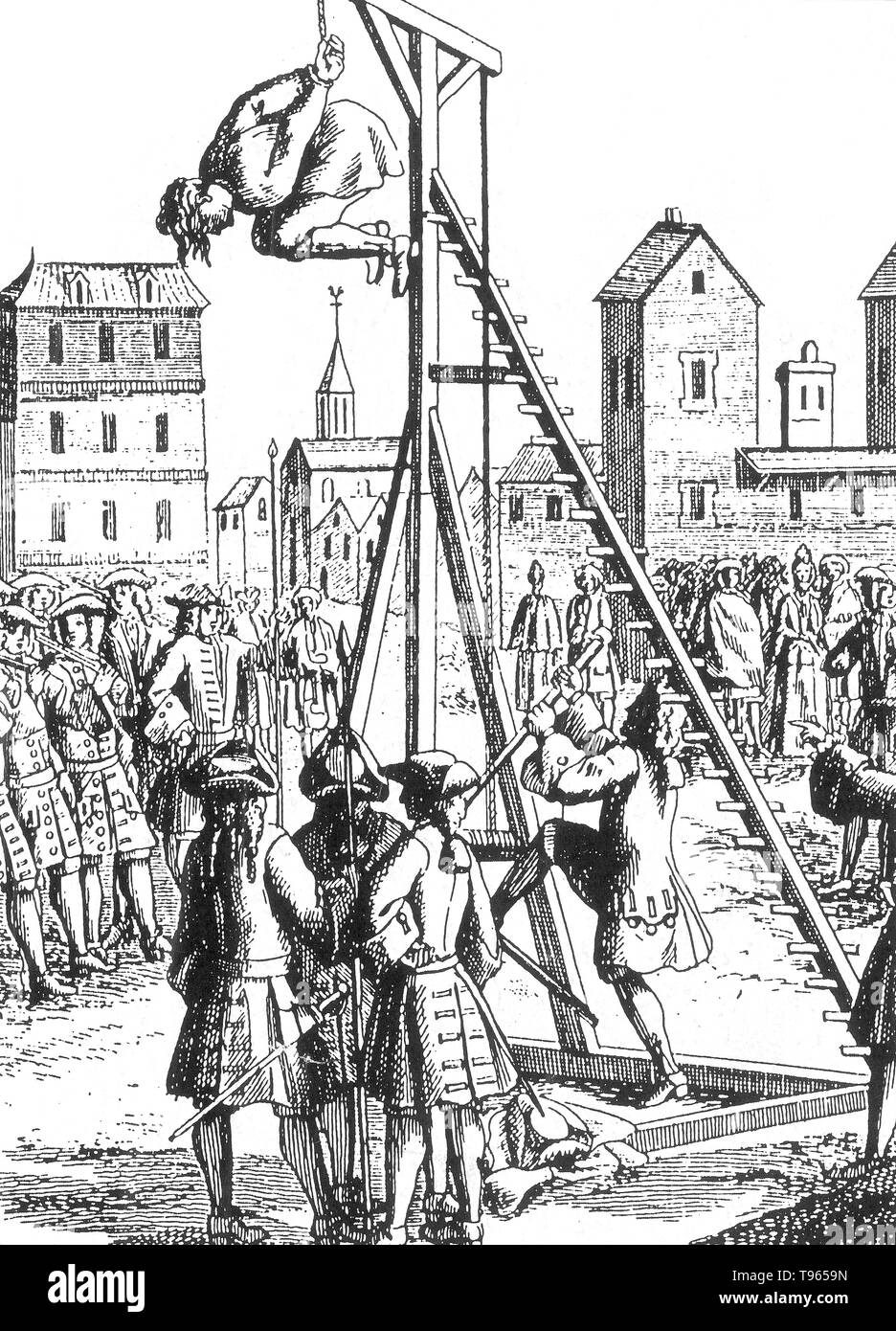 La strappado è una forma di tortura in cui la vittima ha la sua o le sue braccia legate dietro la schiena; una grande corda è quindi legato ai polsi e passata su una puleggia, una trave o un gancio sul tetto. Il torturatore tira su questa corda fino a quando la vittima è appeso i bracci. Poiché le mani legate dietro la vittima torna, questo causerà un intenso dolore e possibile dislocazione dei bracci. Foto Stock