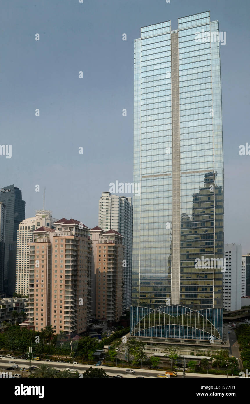 Alto edificio di rischio menara Sahid Sudirman, al centro del business Distrik Foto Stock