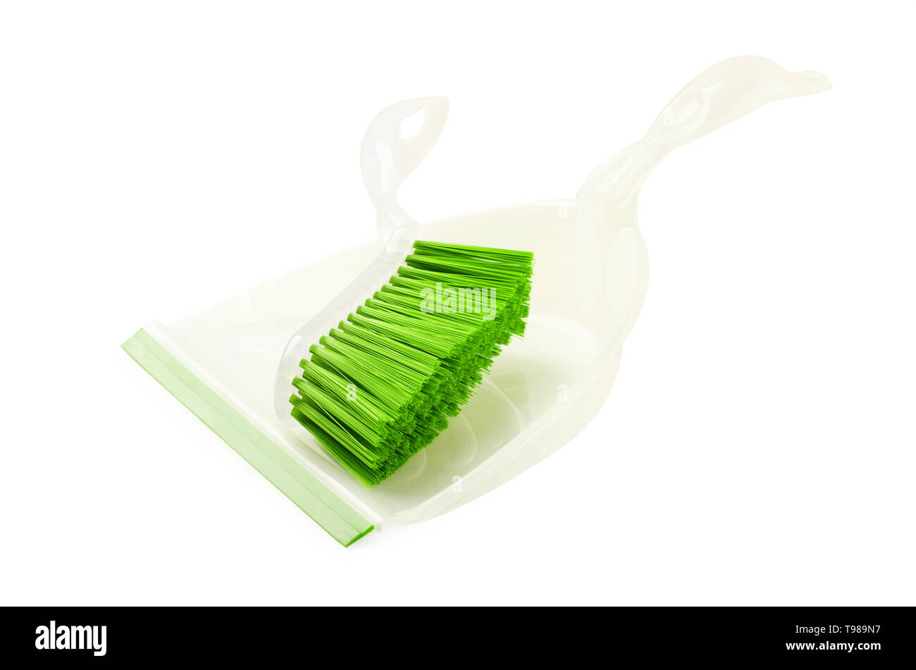Serie verde della spazzola e paletta, pulizie domestiche recipiente isolato su uno sfondo bianco Foto Stock
