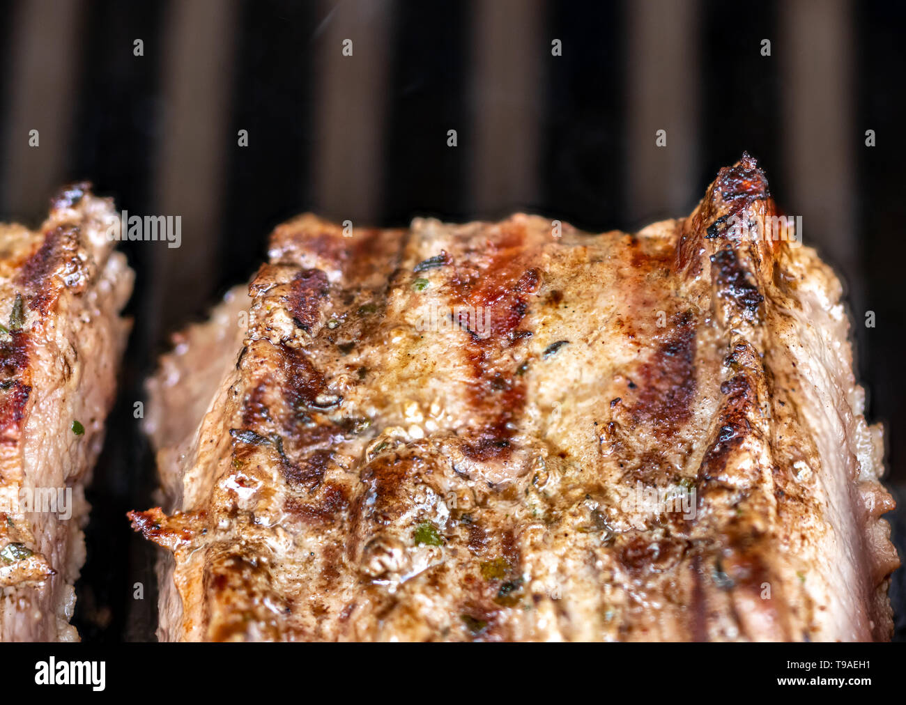 Carne di agnello alla griglia, sfondo con spazio di copia Foto Stock