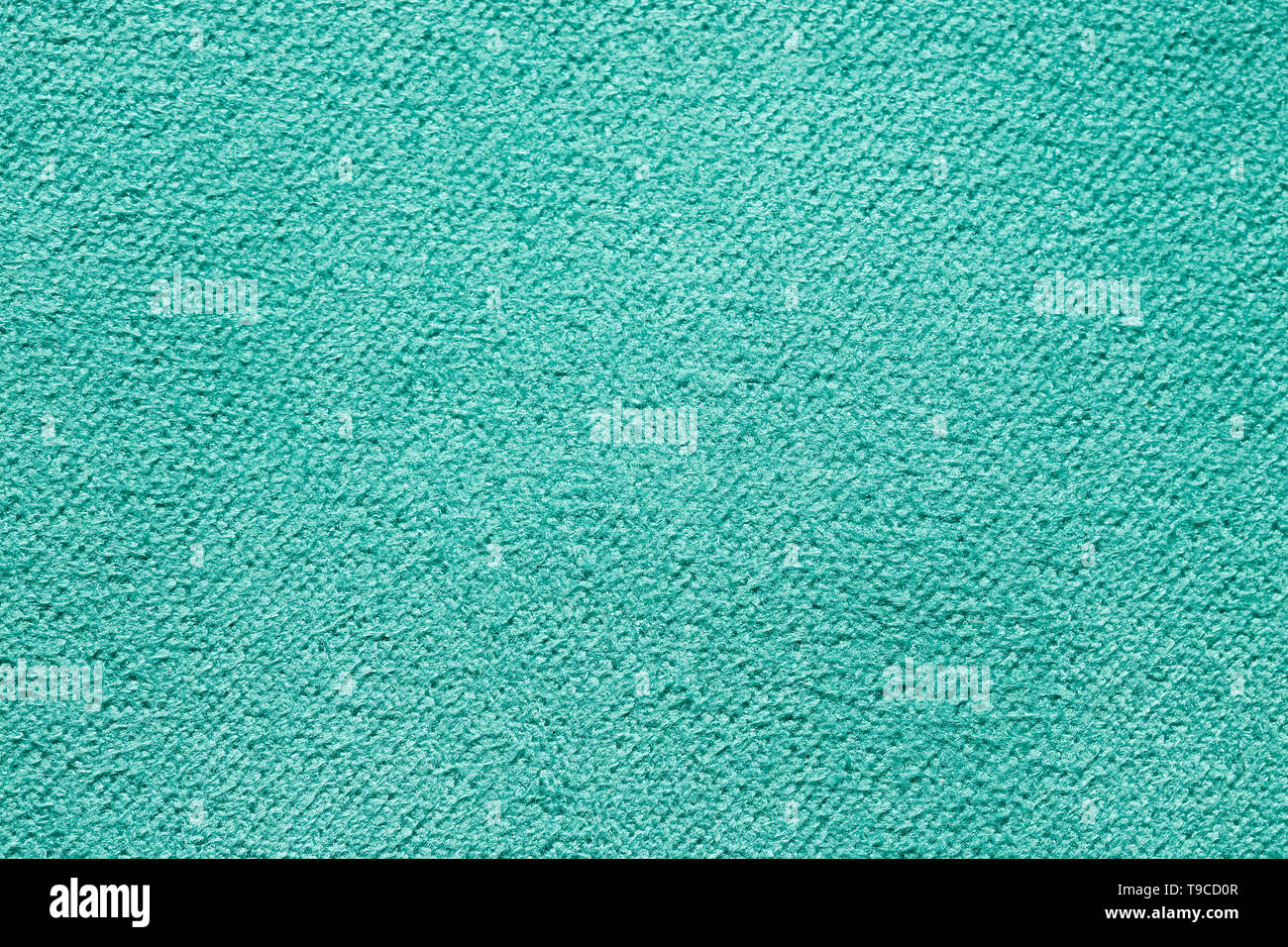 Vicino la consistenza del tessuto blu o jersey pattern usate per il web design e sfondo. Foto Stock