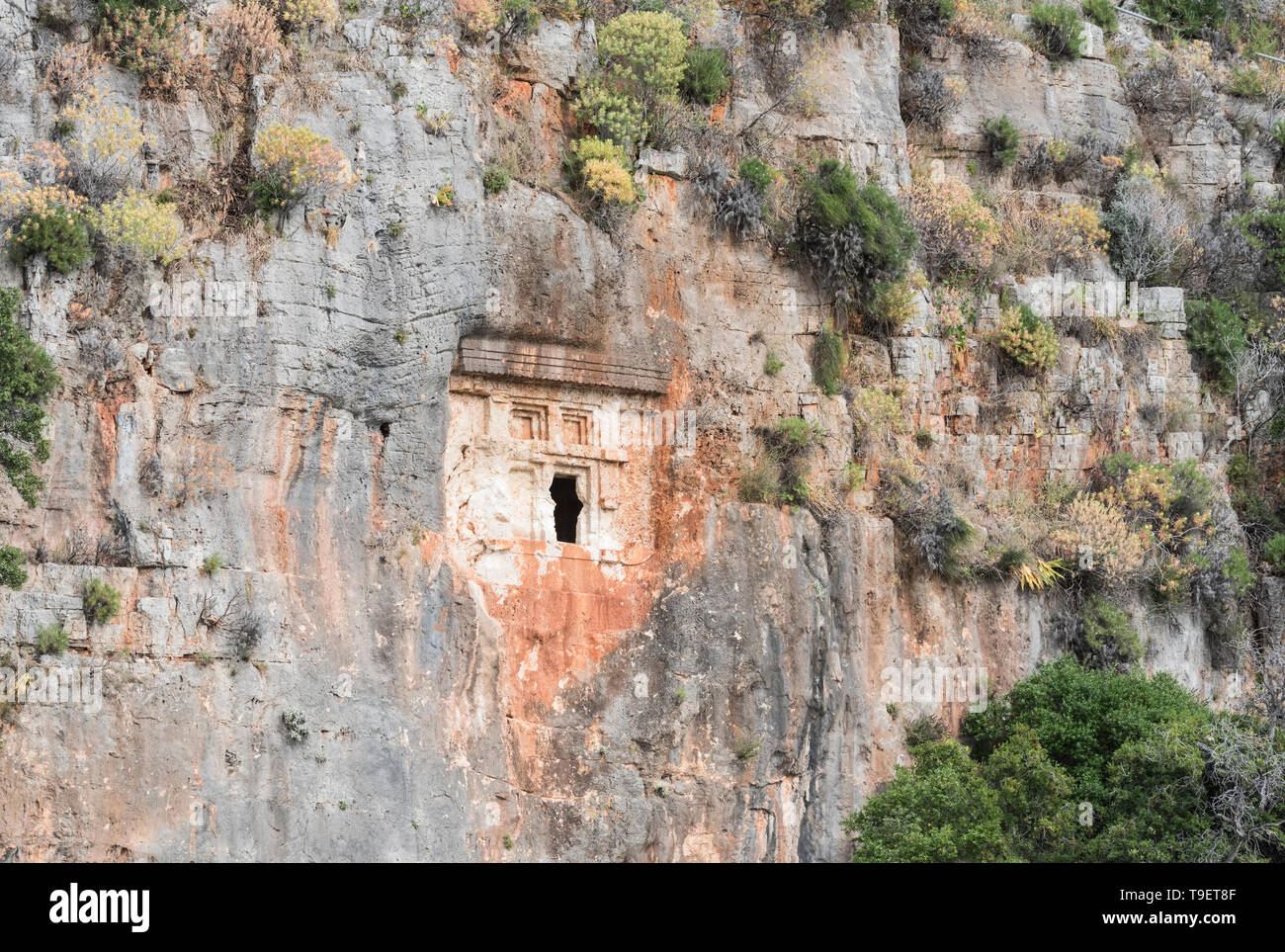 Lycian rock cut tomba nella roccia vicino a Kas, Turchia Foto Stock