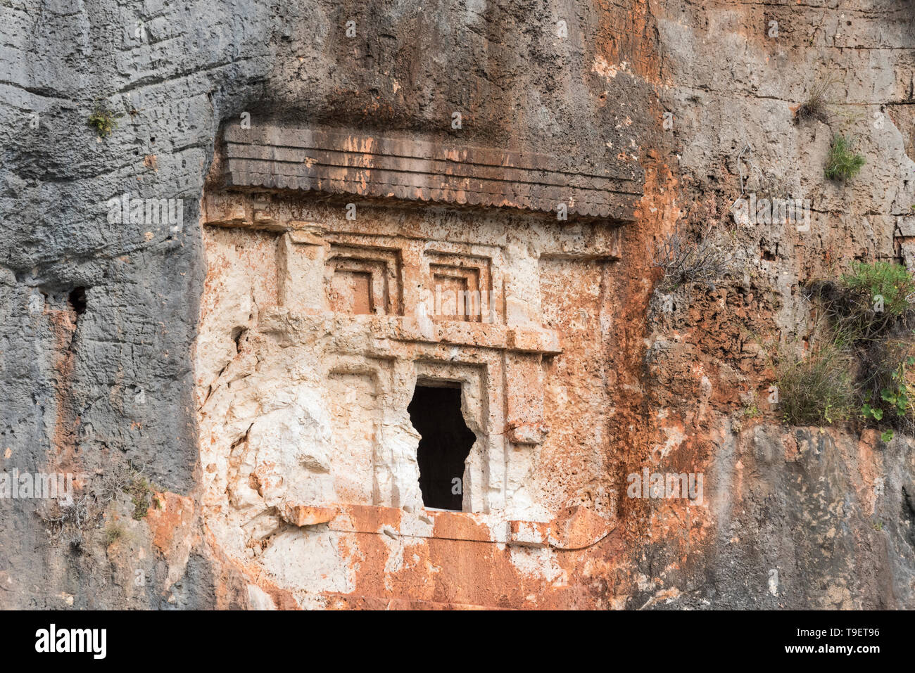 Lycian rock cut tomba nella roccia vicino a Kas, Turchia Foto Stock