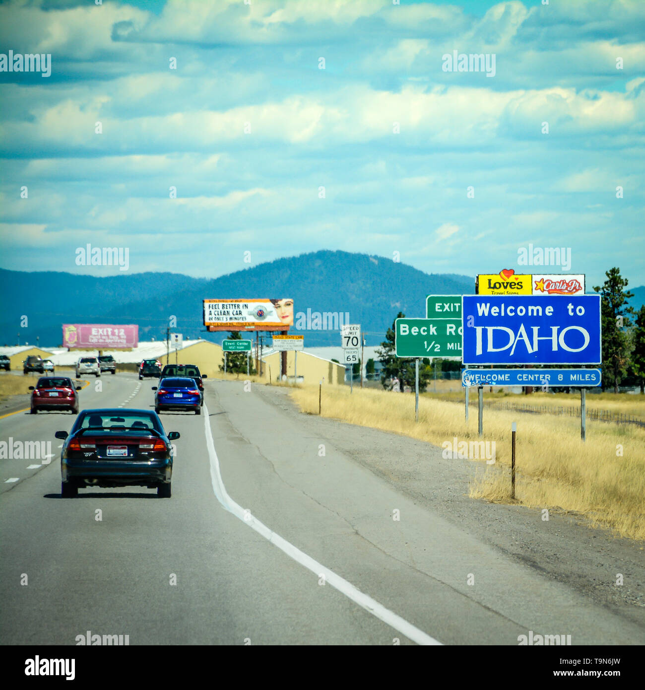 Big Blue " Benvenuti a Idaho" cartello stradale al di fuori della Interstatale 90 in direzione est dalla stato di Washington, USA Foto Stock