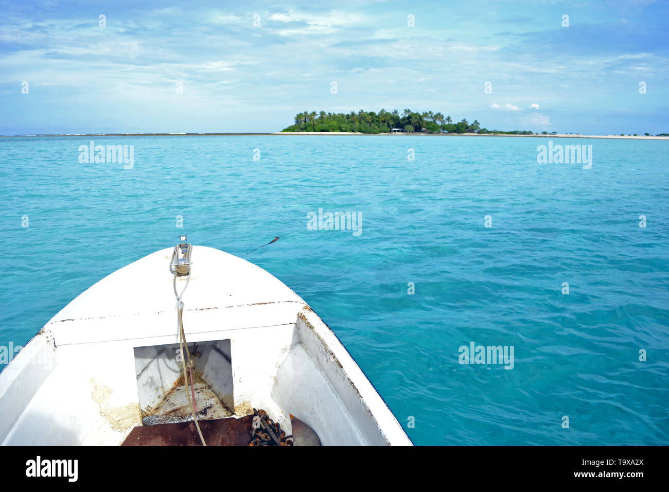 Vista la barca di Nukuhione motu, isola di Wallis, Wallis & Futuna, Sud Pacifico Foto Stock